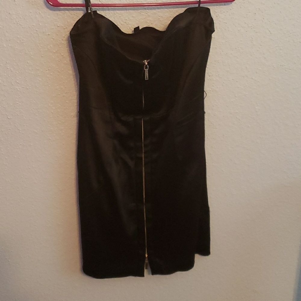 Zip up Bebe dress size Medium
